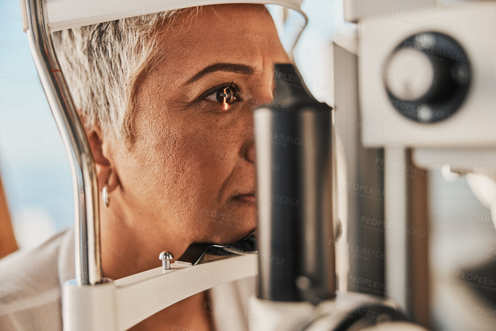 Buy stock photo Medical, ophthalmology and eye test by patient senior woman with medical insurance using slit lamp. Mature, optometry and female doing vision or eyesight test in clinic using a machine 