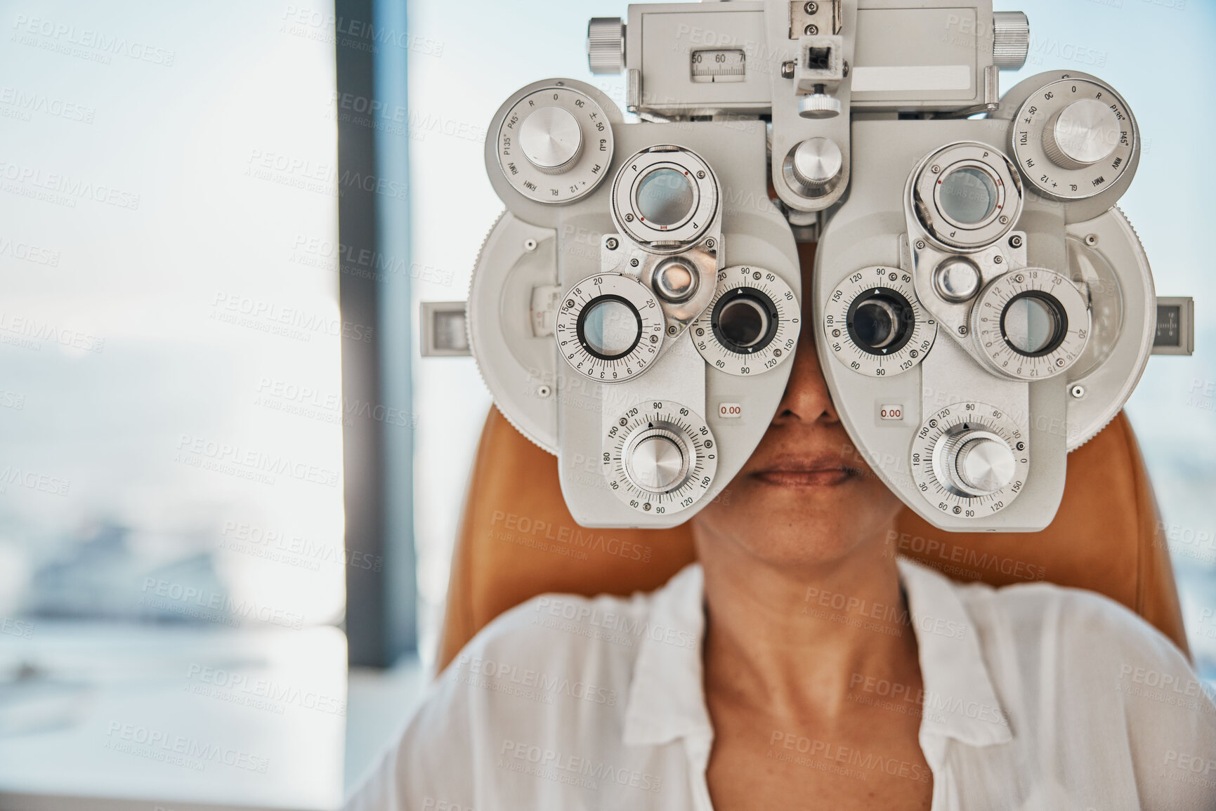 Buy stock photo Vision, eye exam and woman in optometry test for wellness, eyesight and optical assessment. Healthcare, optometrist consultation and patient with medical equipment, phoropter and lens for eyes