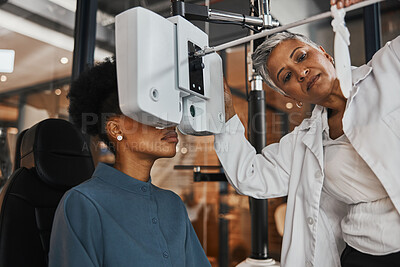 Buy stock photo Eye exam, vision and woman patient in optometry clinic for testing, eyesight and optical assessment. Healthcare, optometrist consultation and doctor use medical equipment, phoropter and lens for eyes