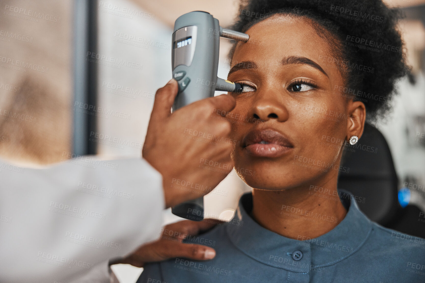 Buy stock photo Hands, eye exam or black woman consulting doctor for eyesight at optometrist for assessment. Face of African customer testing vision with tonometer by an optician testing iris or retina visual health