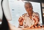 Glasses, optometry and check with a mature woman optician looking at a pair of frame spectacles in the office. Eyewear, healthcare and examine with a female optometrist checking prescription lenses