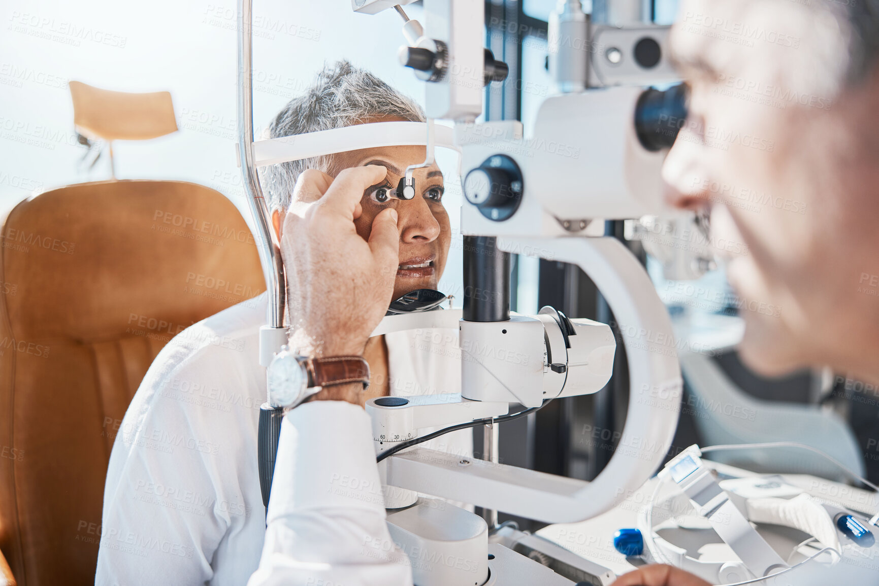 Buy stock photo Senior eye exam, glaucoma check and medical eyes test of elderly woman at doctor consultation. Vision, healthcare focus and old female patient with consulting wellness expert for lens and glasses 
