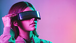 Virtual reality, cyberpunk and mockup, woman in goggles in online metaverse app, game or video on neon purple background. Vr, ar and ux, future fashion digital glasses on model in studio with space.