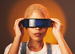 Black woman, vr and futuristic cyberpunk glasses in online metaverse app or game or video on brown background. Virtual reality, future fashion and digital augmented reality goggles on model in studio