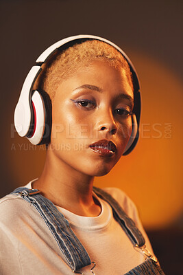 Buy stock photo Portrait, music headphones and black woman in studio isolated on a background. Face makeup, beauty technology and female model streaming or listening to radio, audio album or podcast with headset.