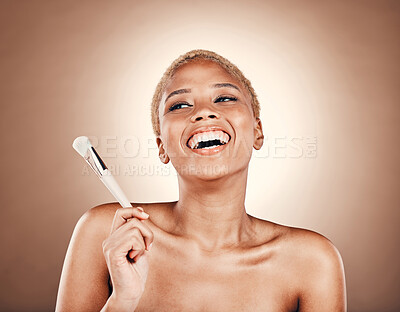 Buy stock photo Happy, beauty and makeup with black woman and brush for cosmetics, self care and glowing skin. Facial, skincare and smile with model and tool for foundation, power and product in studio background