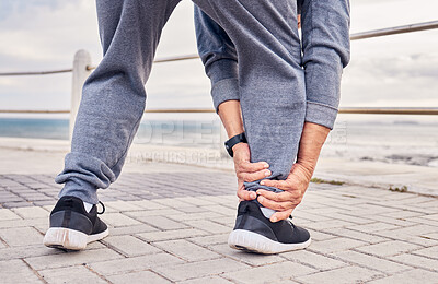 Buy stock photo Ankle, pain and man exercise outdoor at beach with medical risk, sports wound and fitness. Male runner, foot injury and joint problem of body muscle, first aid and health emergency at ocean promenade