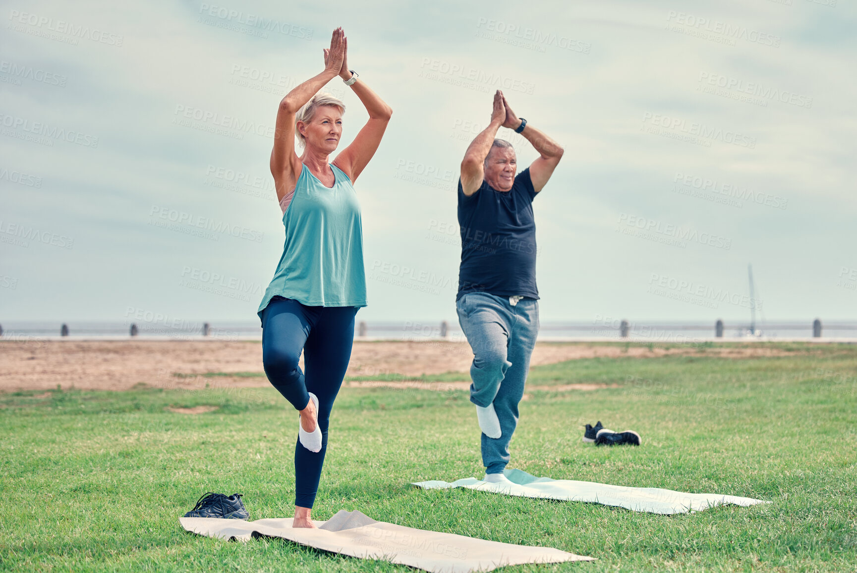 Buy stock photo Yoga, fitness and senior couple wellness in park zen, holistic meditation or retirement health for calm mind. Mountain pose, Tadasana or prayer of elderly people training, learning pilates or workout