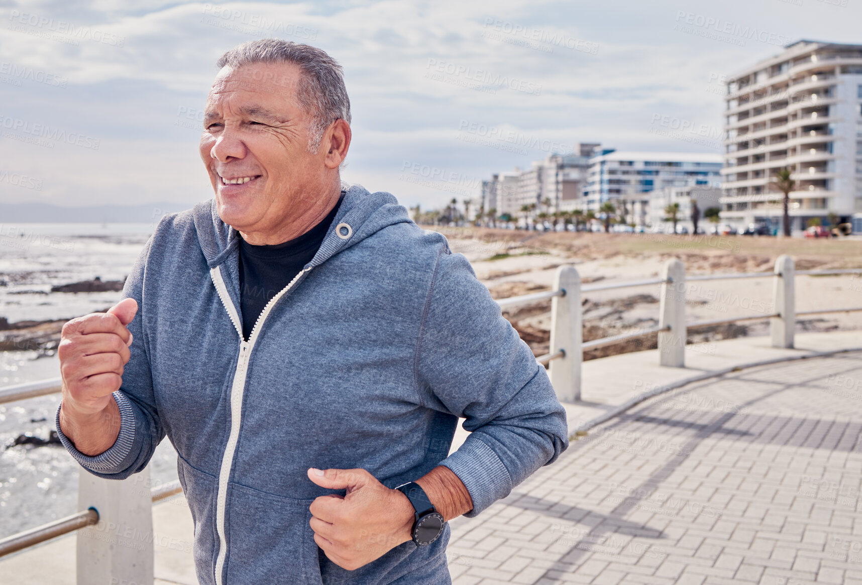 Buy stock photo Senior man, fitness and running at ocean sidewalk for energy, wellness or workout in Miami. Elderly male, cardio exercise and happy runner at seaside promenade of training, sports and smile of action