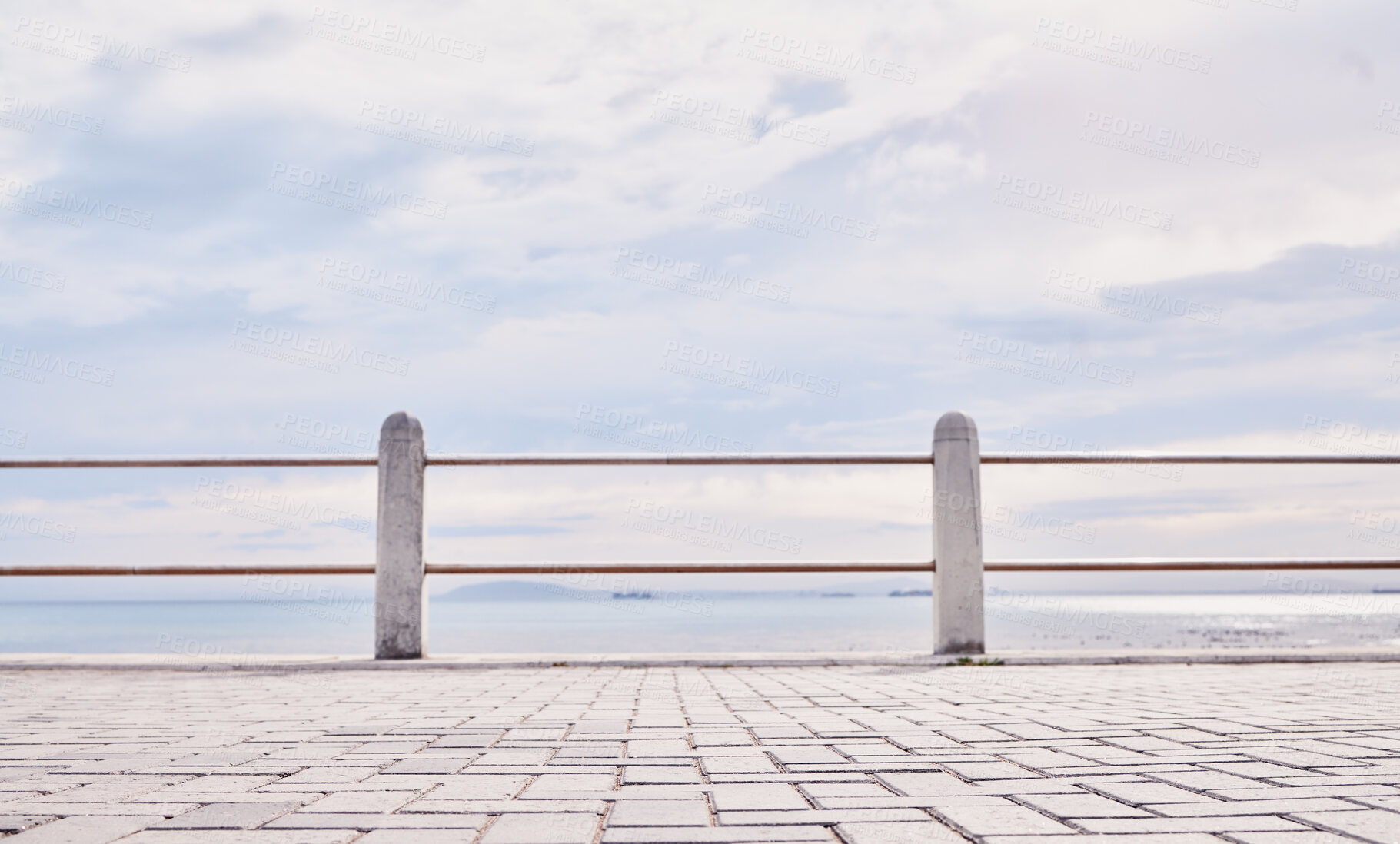 Buy stock photo Morning, beach and view of ocean from the promenade of the water, nature and landscape in Italy. Travel, natural and peaceful tourism site by the sea to relax and be calm on the coast for traveling