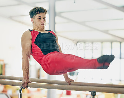 Buy stock photo Gymnastics, man and stretching for training, routine and exercise for performance, healthy lifestyle and fitness. Gymnast, guy or male athlete in gym, practice for competition or movement for balance