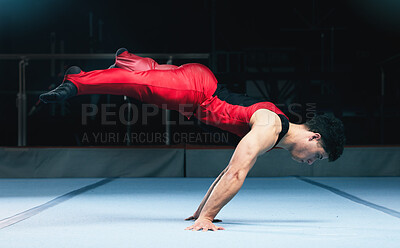 Buy stock photo Gymnast, handstand and man on gym floor for training, balance and wellness with muscle, strong body and night. Gymnastics, athlete and exercise in studio for competition, goals and fitness for sport