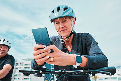 Buy stock photo Mature woman, phone or electrical bike helmet in transport location, clean energy or sustainability travel with GPS map. Technology, electric or eco friendly bicycle and mobile, cycling man or couple