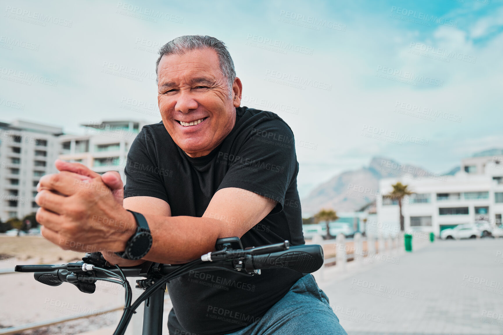 Buy stock photo Portrait, bike and cycling with a senior man on the promenade, riding eco friendly transport for travel. Face, smile and health with a happy mature male cyclist sitting on his bicycle outdoor