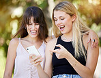 Laughing, smile or girl friends with phone in park for online meme, reading comic blog or social media. Couple, happy or women on 5g smartphone for networking communication or funny news outdoors