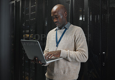 Buy stock photo Server room, laptop and black man technician with data center management, system and cybersecurity. Focus, serious and inspection of engineering or programmer person with information technology code