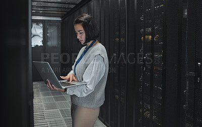 Buy stock photo Server room, laptop and technician woman for data center management, system update and cyber security. Focus, serious and inspection of asian electrician, engineering or programmer person typing code