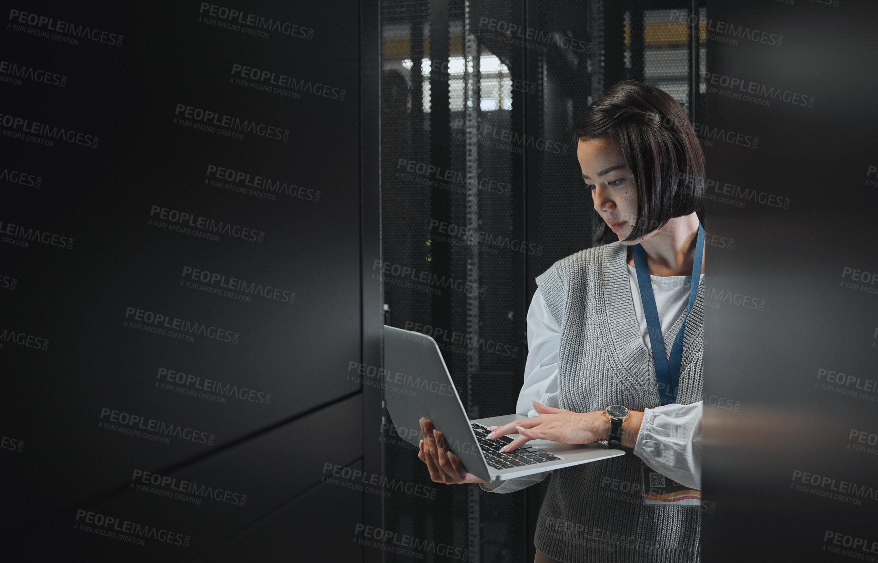 Buy stock photo Woman with laptop, datacenter and information technology, engineer and server room with software update. Tech industry, cybersecurity and network with Asian female setting up firewall and database