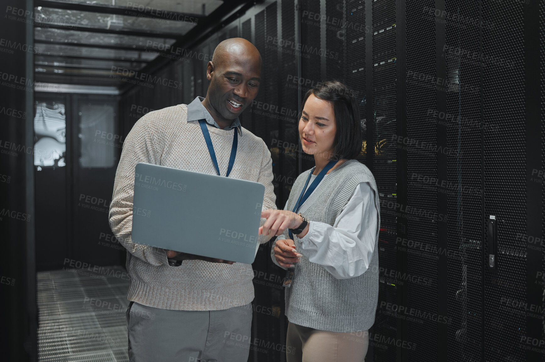 Buy stock photo Business, black man and woman with laptop, servers and cyber security for connection, data analytics and conversation. IT specialist, female programmer and employees with device and cloud computing