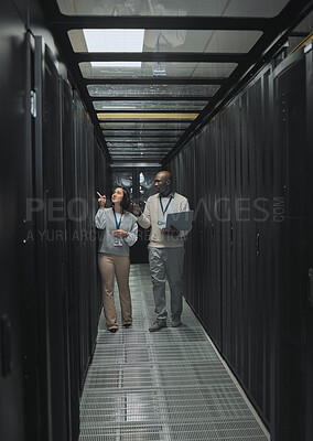 Buy stock photo Laptop, teamwork or IT people in server room for maintenance, analysis or digital innovation. Data center, cybersecurity or man and woman programmer for planning network strategy or system firewall
