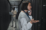 Phone call, technician and woman in a server room for maintenance, repairs or data analysis. Systems, technology and Asian female engineer on mobile conversation while checking power of cable service