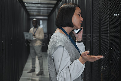 Buy stock photo Phone call, technician and woman in a server room for maintenance, repairs or data analysis. Systems, technology and Asian female engineer on mobile conversation while checking power of cable service