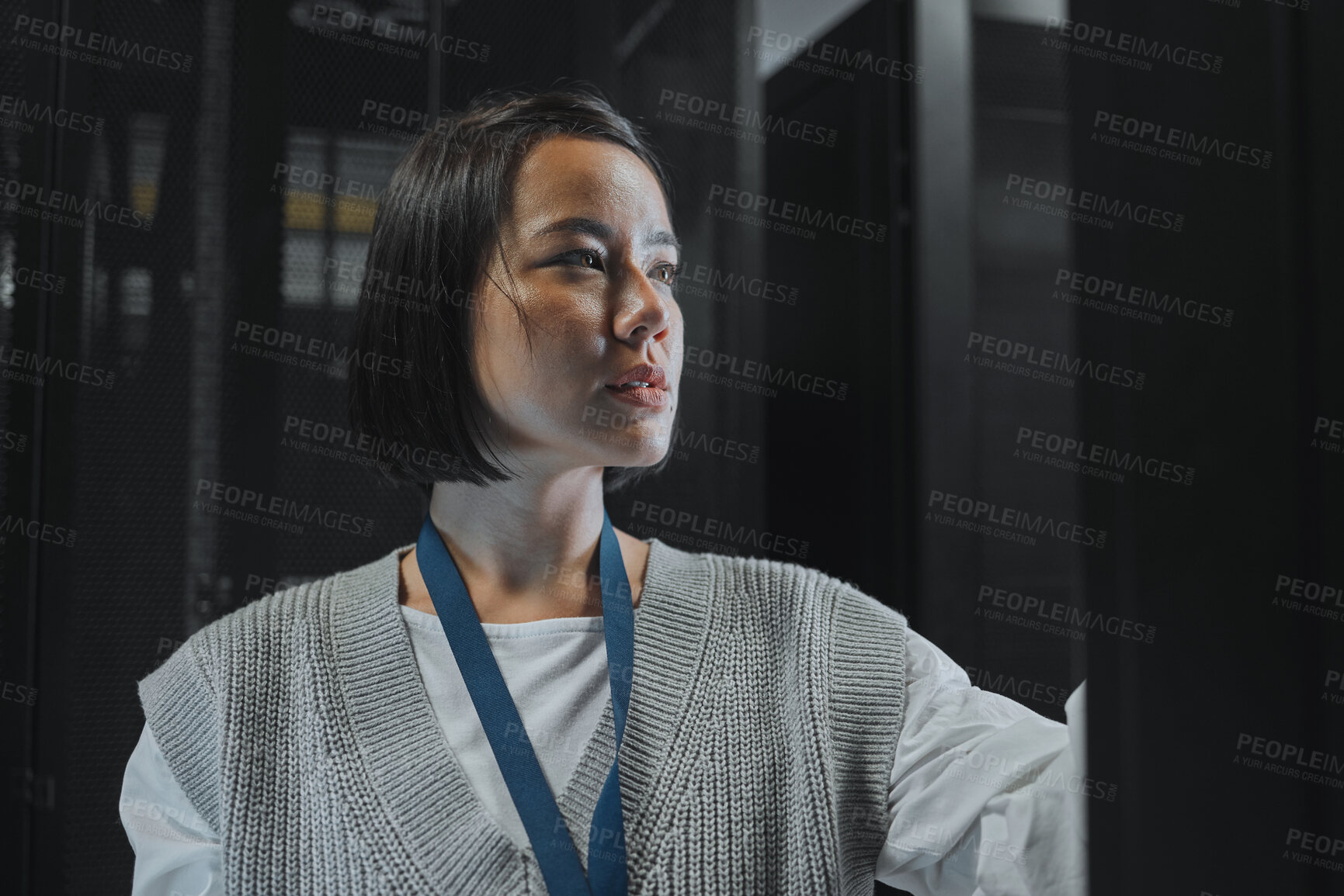 Buy stock photo Serious, maintenance or IT woman in server room for analysis, engineer working in data center. Thinking, cybersecurity and girl programmer with tech for problem solving, diagnose or troubleshooting