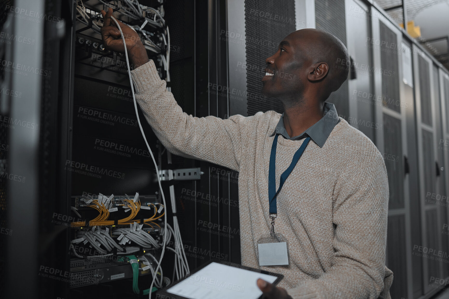 Buy stock photo Engineer, server room and black man with cable and tablet for database maintenance or software update. Cybersecurity, it or startup male coder on tech for programming or networking in data center