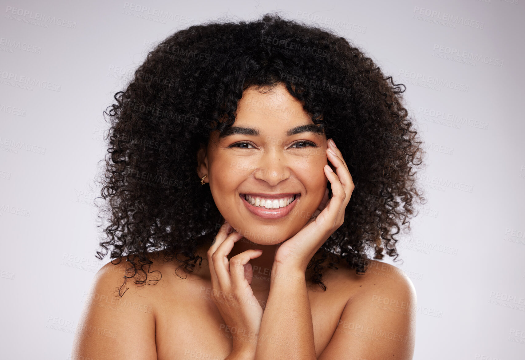 Buy stock photo Portrait, skincare and afro with a model black woman in studio on a gray background for natural hair treatment. Face, beauty and haircare with an attractive young female posing to promote cosmetics