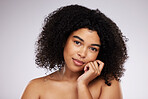 Black woman, beauty and face, skincare portrait and natural cosmetics, hair care and glow on studio background. Hand,  skin and wellness with dermatology, cosmetic and makeup with African female