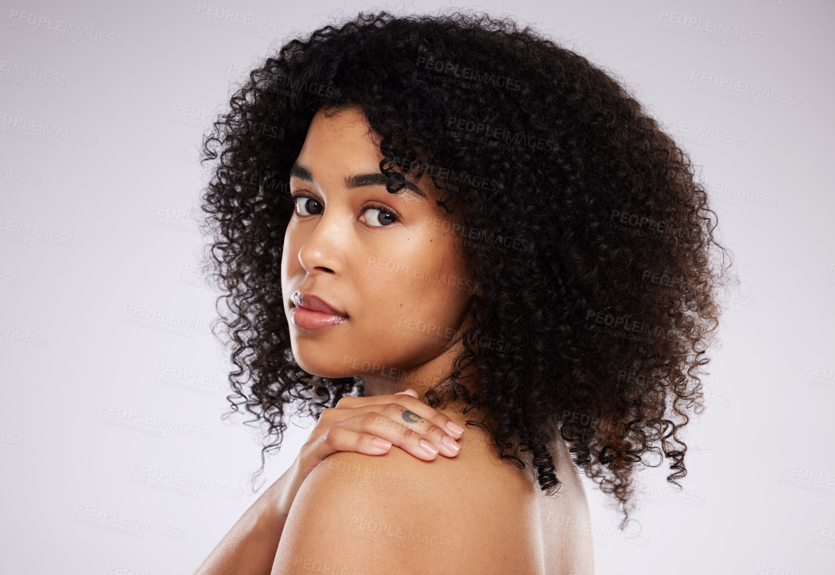 Buy stock photo Black woman, hair and afro in studio portrait with beauty, wellness and cosmetic skincare glow by background. Young gen z model, african and cosmetics with clean face, natural and healthy aesthetic