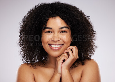 Buy stock photo Portrait, beauty and hair with a model black woman in studio on a gray background for natural afro treatment. Face, skincare and haircare with an attractive young female posing to promote cosmetics