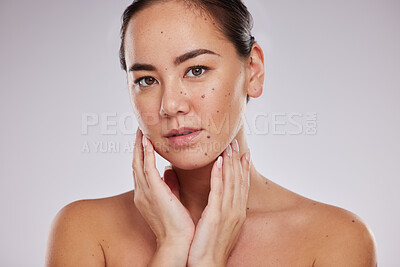 Buy stock photo Asian woman, face beauty and skincare portrait in studio for dermatology cosmetic and skin glow. Aesthetic model person with hand for makeup shine and luxury facial self care on grey background