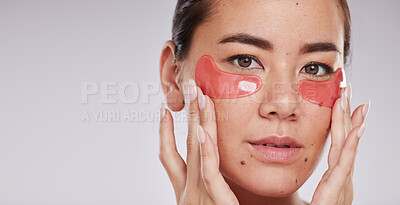 Buy stock photo Skincare, face portrait and woman with eye patches in studio isolated on a gray background mock up. Dermatology, cosmetics and female model with facial pads or products for beauty or skin treatment.