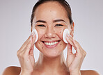 Skincare cotton, face portrait and Asian woman in studio isolated on a gray background. Makeup hygiene, beauty dermatology and happy female model with facial pad or product for cleaning cosmetics.