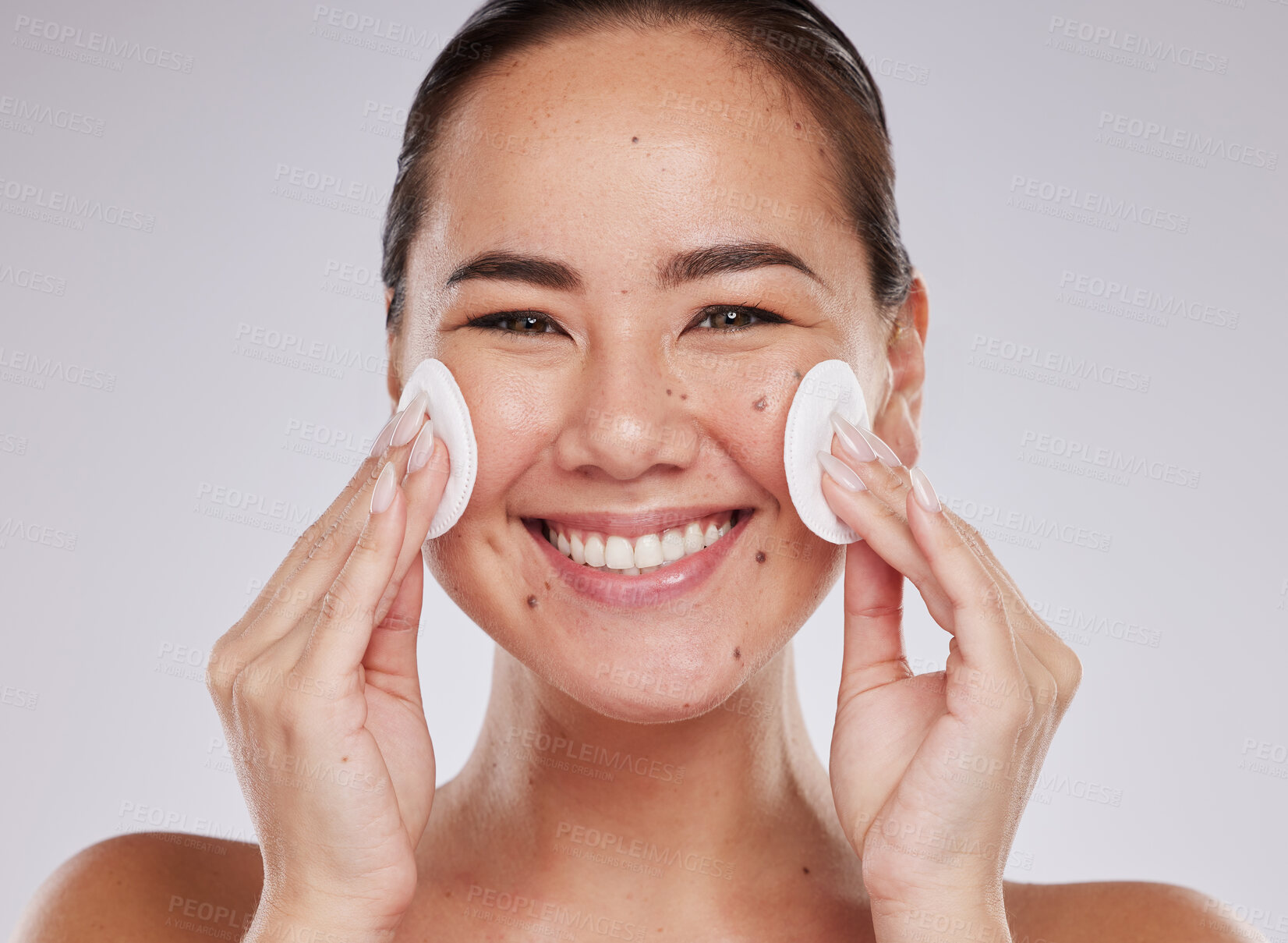 Buy stock photo Skincare cotton, face portrait and Asian woman in studio isolated on a gray background. Makeup hygiene, beauty dermatology and happy female model with facial pad or product for cleaning cosmetics.