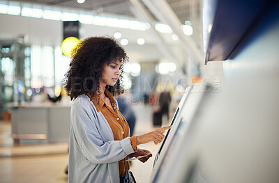 Buy stock photo Black woman, airport and self service station for ticket, registration or online boarding pass. African American female traveler by terminal machine for travel application, document or booking flight