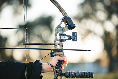 Buy stock photo Archery bow closeup and woman hands at shooting range for competition, game or learning in field or outdoor sports.  Person with arrow for gaming, adventure and hunting with aim and target practice