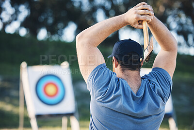 Buy stock photo Man axe throwing at sports range, archery training or practice with board circle for action, game and fitness. Strong person with weapon for tomahawk competition, gaming and park or field with target