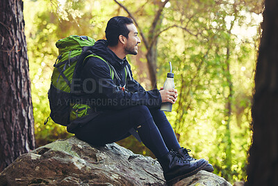 Buy stock photo Relax, hiking or water bottle in forest, nature woods or fitness environment for break, electrolytes or healthcare wellness. Hiker man, backpacker or sports drink in rest, recovery or thirsty workout
