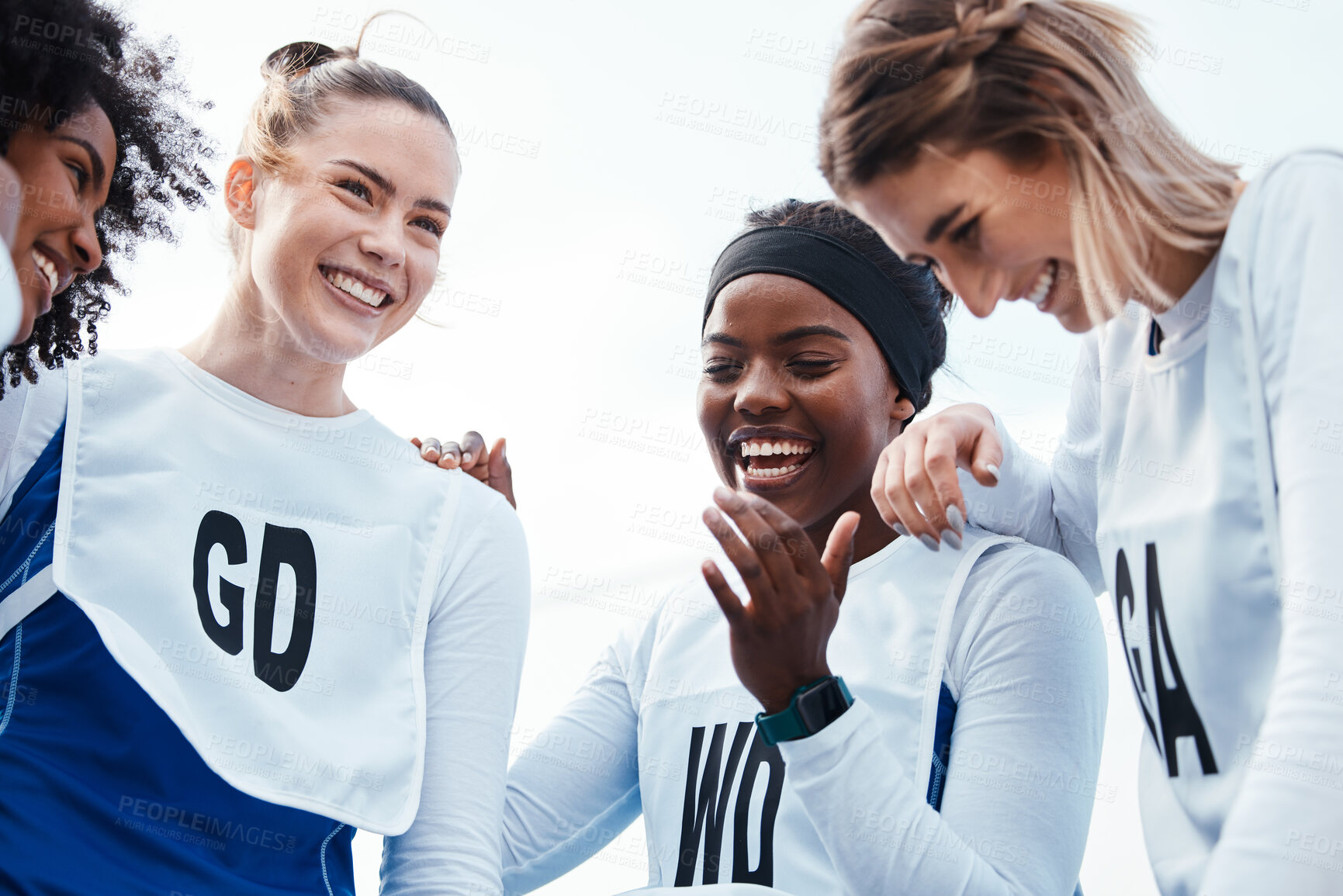 Buy stock photo Netball, women or happy group with sports team building, funny conversation and support for training or practice. Athlete friends, people or gen z excited for outdoor game in diversity circle talking