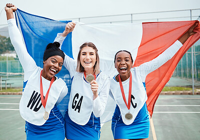 Buy stock photo Netball winning portrait, flag and sports team celebration, excited or celebrate award winner, competition victory or game. France group success, teamwork achievement or athlete happy for prize medal