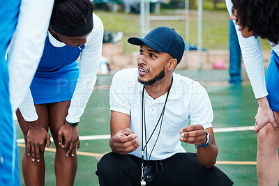 Buy stock photo Coach, strategy and teamwork with sports people listening to tactics or instructions on a court. Fitness, team and planning with a black man talking to a group of girls during a competition 