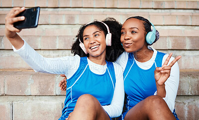 Buy stock photo Selfie, netball and sports women or friends with headphones for training break, social media post and happy music. Athlete black people, teenager or gen z in profile picture and peace emoji hand