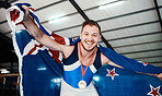 Win, gymnastics and portrait of a man with a flag for sports, achievement and celebration. Happy, celebrate and athlete gymnast with a smile for winning, medal and award for sport competition