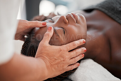 Buy stock photo Beauty, relax and black woman getting a facial massage for health, wellness and self care. Skincare, spa and calm African female sleeping while doing a luxury natural face treatment at a salon.