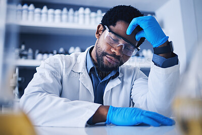 Buy stock photo Burnout, stress and scientist black man with a headache during medical research in a lab or laboratory frustrated and sad. Exhausted, fail and tired professional technician suffering from fatigue