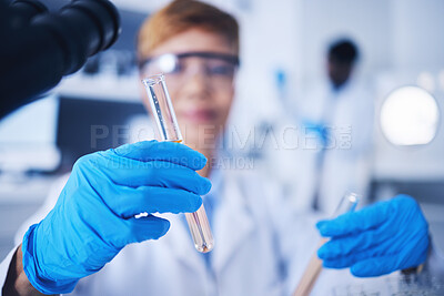 Buy stock photo Glass vials, science and female scientist doing research, experiment or tests in a medical lab. Innovation, professional and senior woman scientific researcher working in a pharmaceutical laboratory.