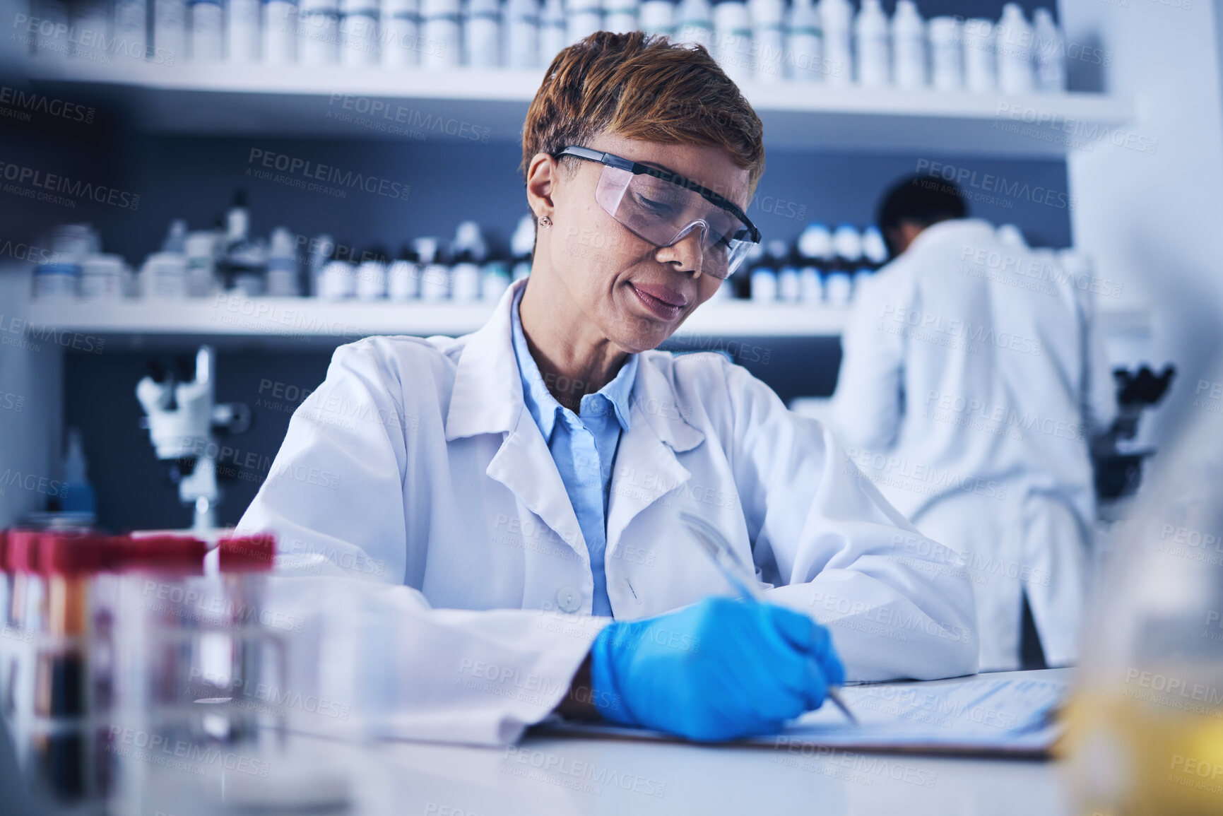 Buy stock photo Black woman, science documents and writing in laboratory for healthcare planning, review or checklist. Scientist, paperwork report and medical research of investigation, results or chemistry analysis