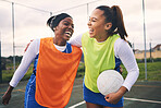 Sports, friends and netball players at court happy, laughing and bond while training outdoors. Funny, women and sport team members bonding with humor, joke or silly conversation during match practice